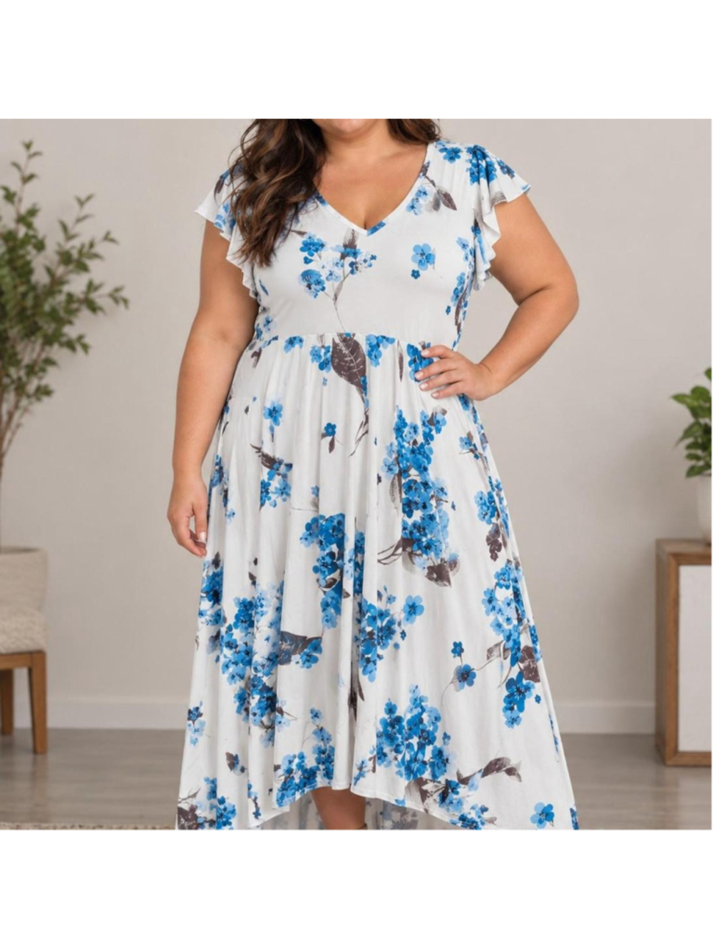 Blue floral print asymmetrical maxi dress with brown leaves on white background